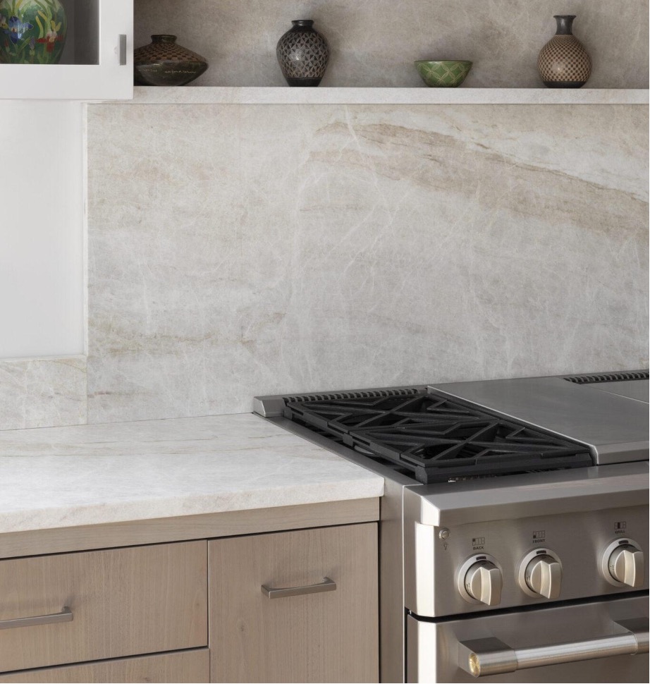 Zoomed in view of a kitchen countertop with neutral, earth-toned colors